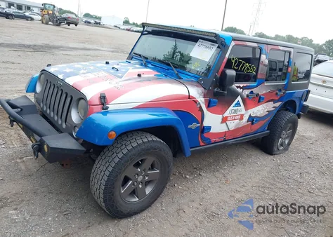 2015 Jeep Wrangler Unlimited Freedom Edition из США, поврежденный, VIN 1C4BJWDG4FL568470